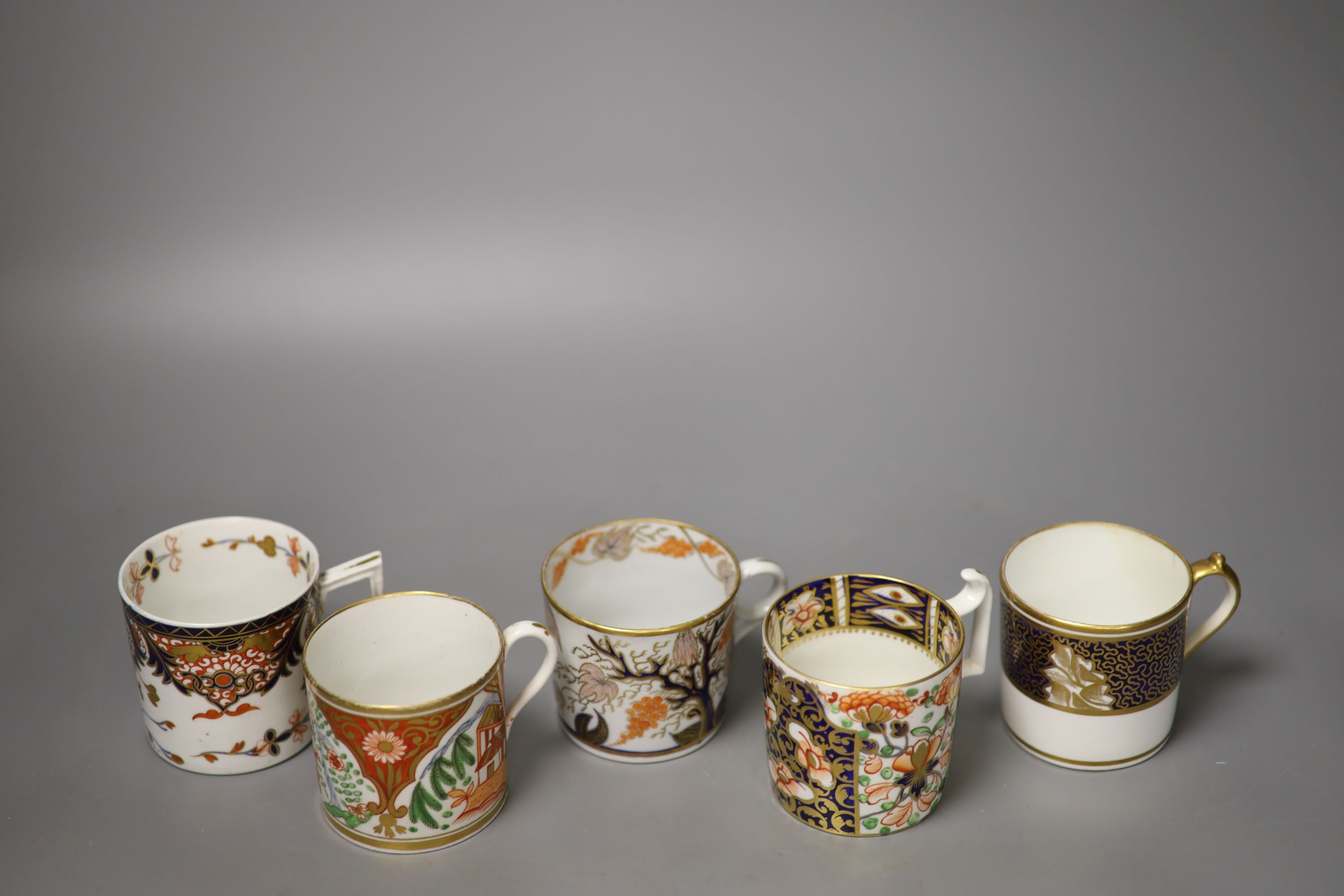 Five English coffee cans,